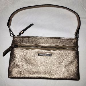 Women's Dana Buchman clutch wristlet in metallic gold.